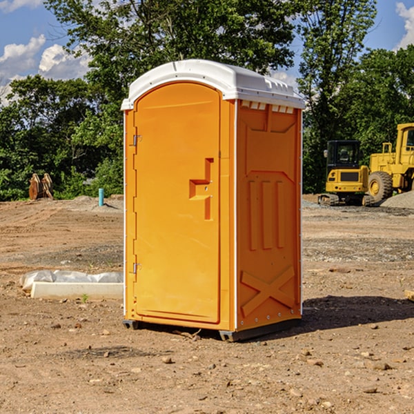 what is the cost difference between standard and deluxe portable restroom rentals in Elm Hall